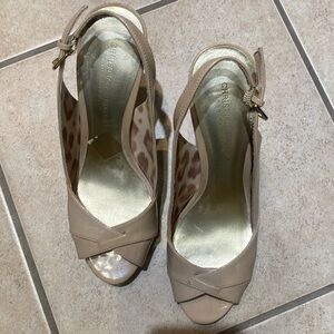 Elegant beige/cream colored, inside leopard print, barely worn strap heels.